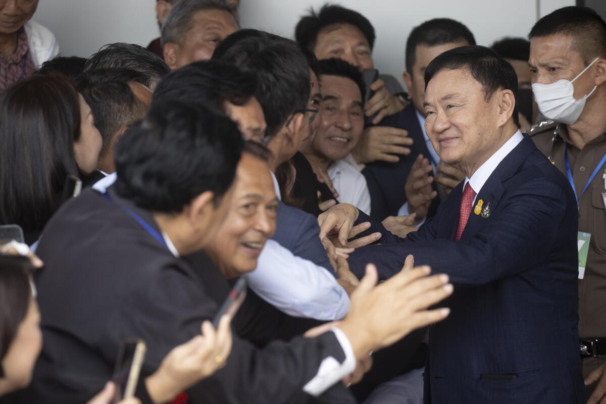 Thaksin Shinawatra Charged with Lese-Majeste