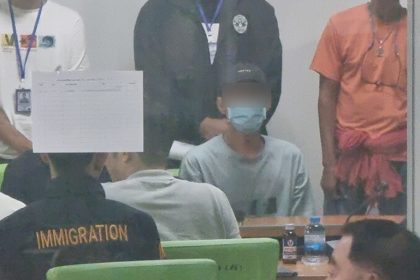 Immigration police interrogate Japanese Yakuza murder suspects