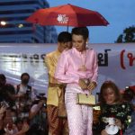 Jatuporn Sae Ung, 25, dressed to emulate the Queen during a demonstration in the Silom area of Bangkok