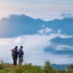 Tourists experince morning fog in Chiang Rai, Thailand