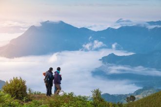 Tourists experince morning fog in Chiang Rai, Thailand