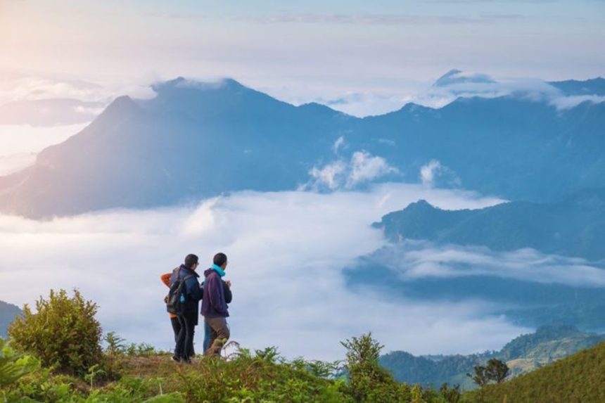 Tourists experince morning fog in Chiang Rai, Thailand