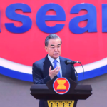 Chinese State Councilor and Foreign Minister Wang Yi delivers a speech at ASEAN Secretariat