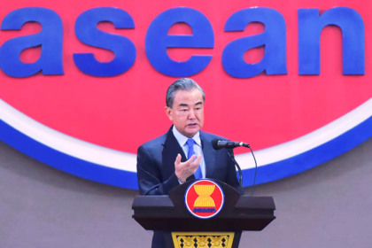 Chinese State Councilor and Foreign Minister Wang Yi delivers a speech at ASEAN Secretariat