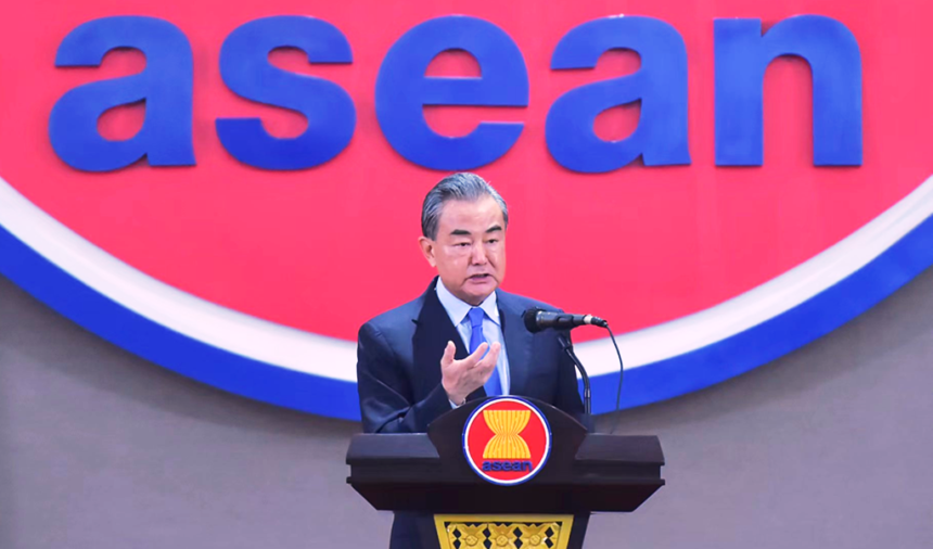 Chinese State Councilor and Foreign Minister Wang Yi delivers a speech at ASEAN Secretariat